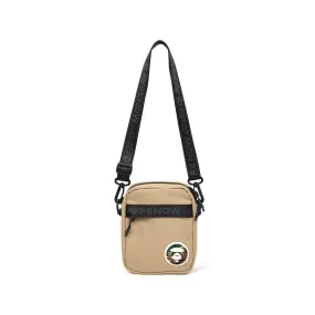 Moonface patch crossbody bag Beige