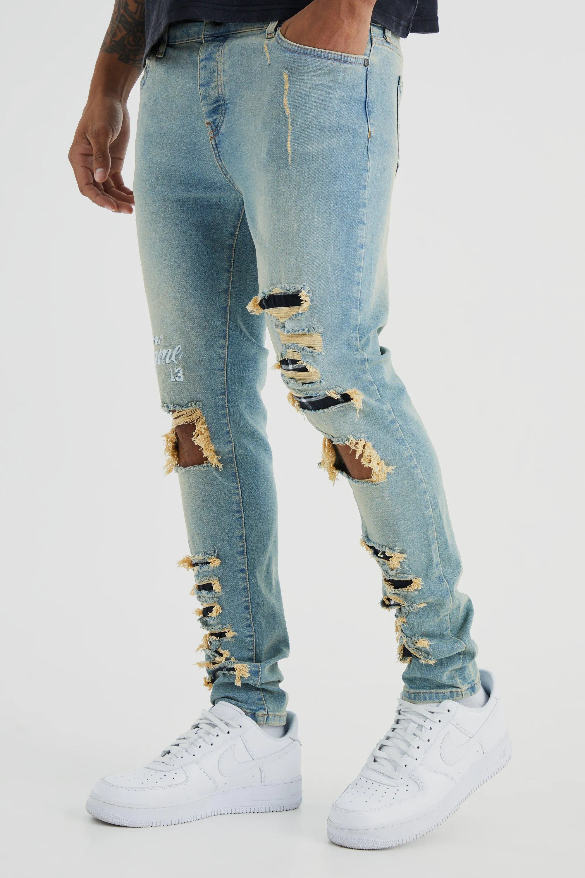 Skinny Stretch Multi Rip Graphic Jeans | boohooMAN UK